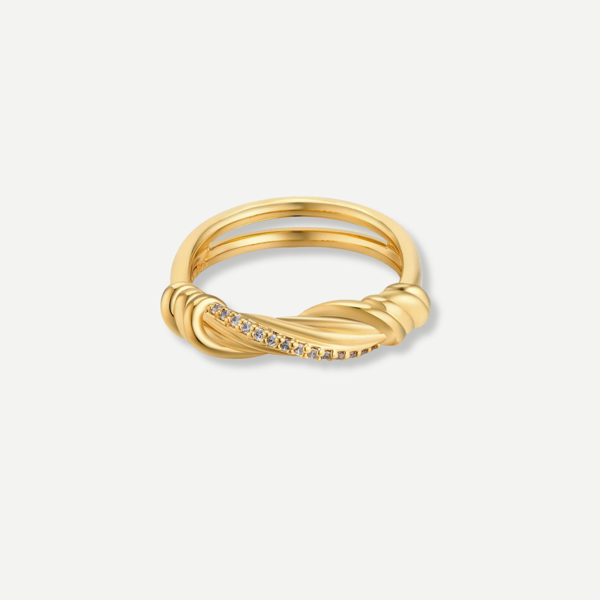 Gold ring with small diamonds on a white background
