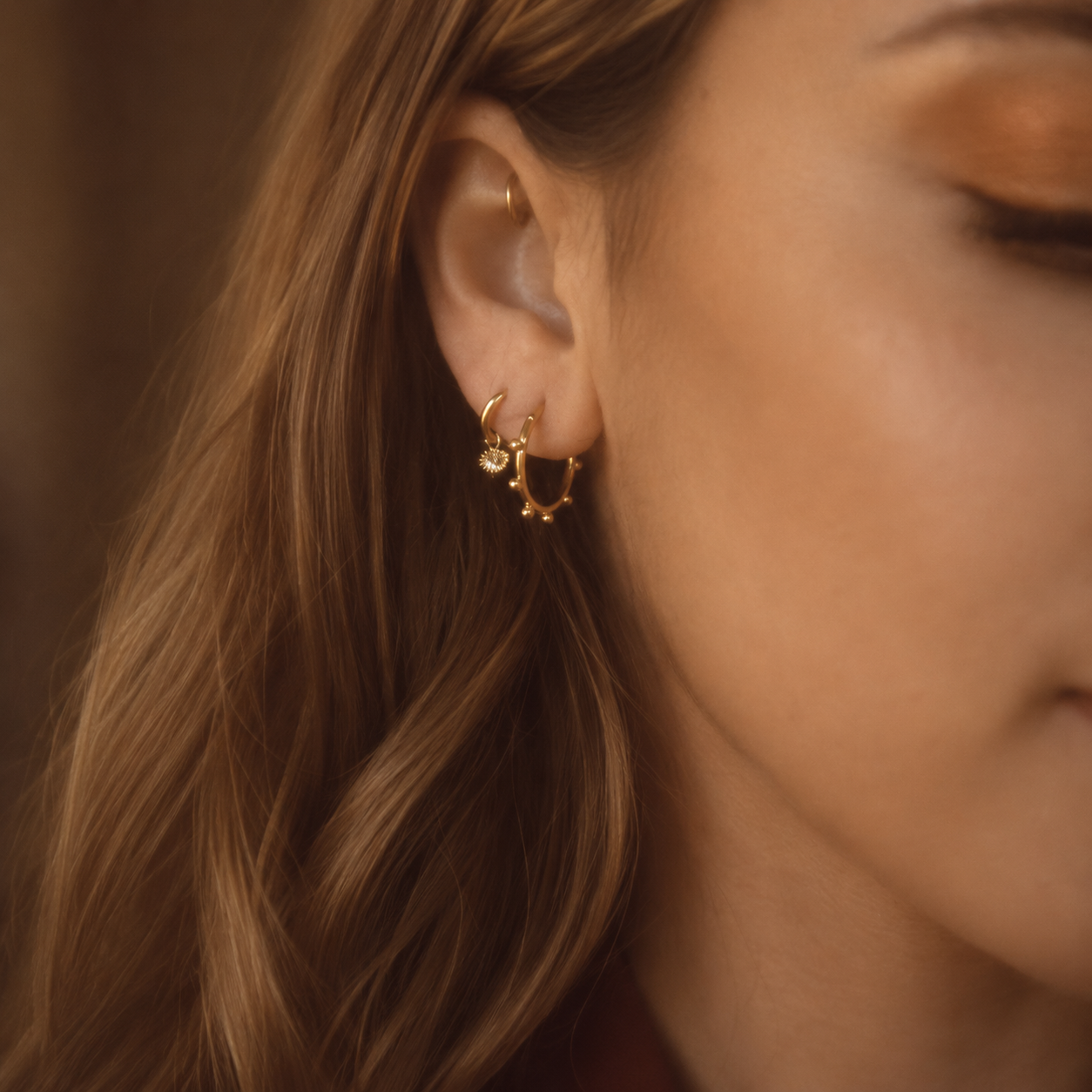Radiant Starburst Gold Earrings