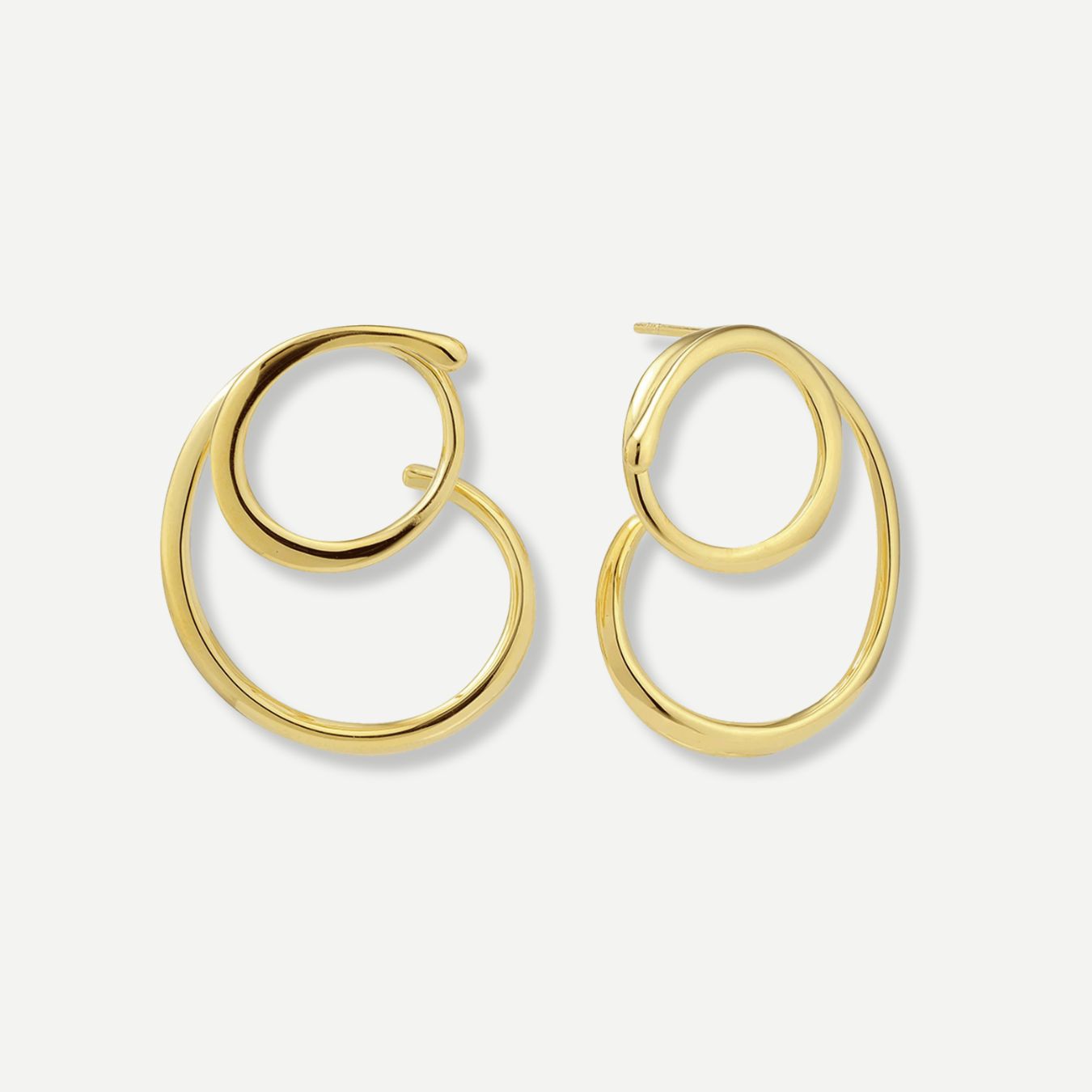 Gold hoop earrings on a white background
