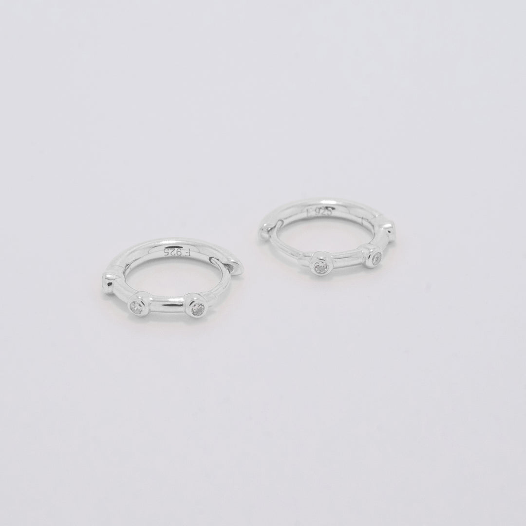 Ostara Silver Huggie Earrings