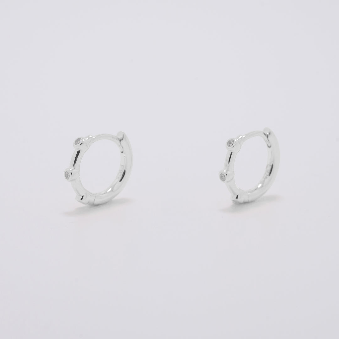 Ostara Silver Huggie Earrings